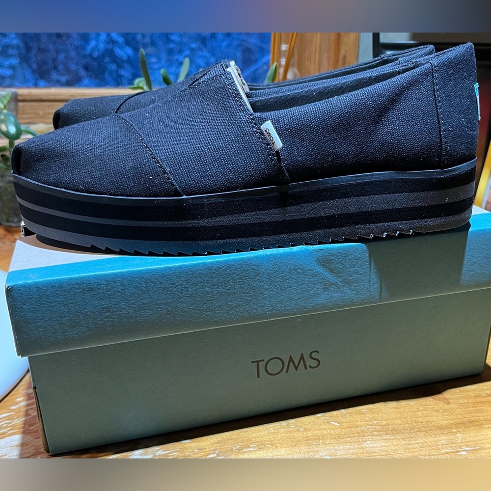 New! Never worn Toms platform shoe.